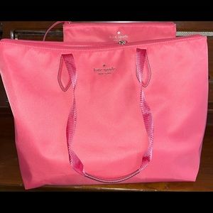 Brand new, authentic Kate Spade tote with matching large wristlet.